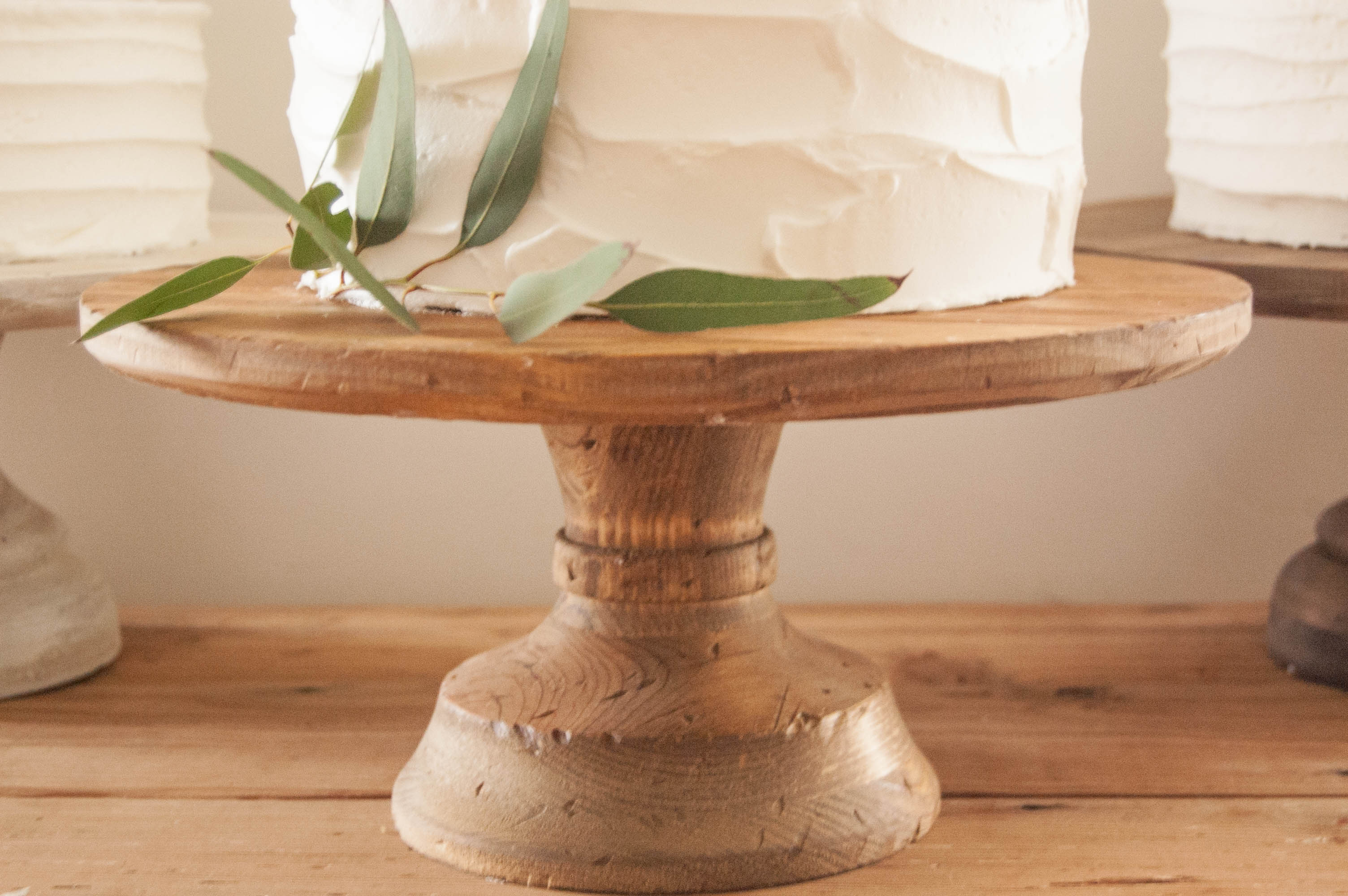 cake stand on kitchen table